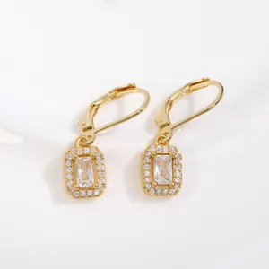 Elegant gold leverback earrings with rectangular zircon center and halo of small diamonds