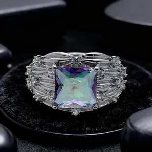Elegant silver ring featuring square iridescent gemstone with diamond pave setting