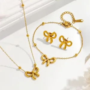 Elegantes vergoldetes Schleifen-Schmuckset mit Edelstahl Halskette, Armband und Ohrringen
