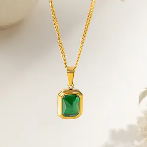 French minimalist 18k gold necklace with an elegant rectangular emerald zircon pendant