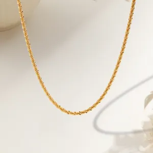 Sparkling 18K gold plated titanium steel necklace featuring a wavy texture and fine chain