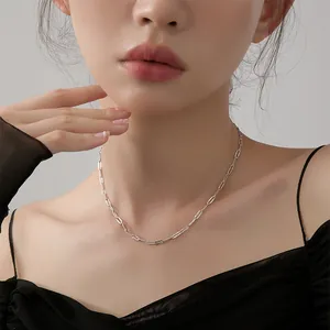 Minimalist silver paperclip link chain necklace for women worn on neck