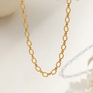 Elegant 18K gold plated stainless steel necklace with oval links on a minimal background