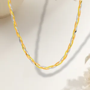 Three-tone braided herringbone necklace in gold, silver and rose gold stainless steel