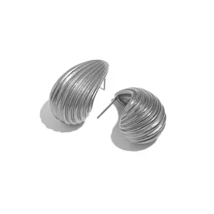 Silver striped teardrop earrings in 18K gold style for a modern minimalist fashion look