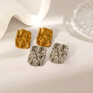 Minimalist lava texture stainless steel stud earrings in gold and silver finish