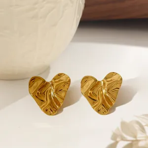 Irregular heart-shaped lava textured earrings in gold-plated stainless steel for women