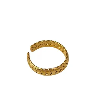 Elegant gold titanium wheat ear woven open ring with a stylish braided texture design