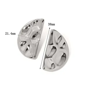 Macro detail of silver lava crinkle earrings showing 38mm length and 21.4mm width