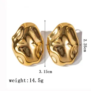 Macro view of gold lava style earrings showing 3.15cm height and 2.25cm width dimensions