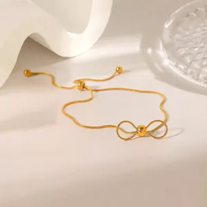 Bracelet élégant à chaîne serpent dorée avec nœud et fermoir coulissant réglable