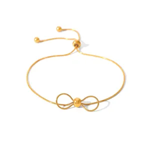 Bracelet coulissant en acier inoxydable doré avec un nœud papillon en maille serpent