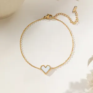 Elegant gold-plated stainless steel heart bracelet with white inlay and lobster clasp