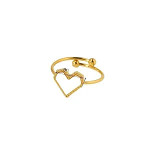 Adjustable golden hollow heart ring with beaded edges and 9mm heart charm on white background