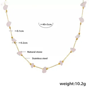 Detail showing natural pink stone beads on a 40cm stainless steel gold chain necklace