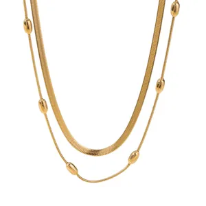 Elegant 18K gold-plated double-layer necklace with snake chain and beaded detail