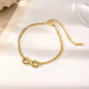 Bracelet double chaîne dorée en acier inoxydable avec pendentif infini et fermoir