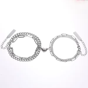 Matching couple magnet bracelets with silver layered chains and heart magnetic buckle