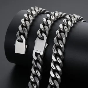 Matte silver Cuban link bracelet with Holy engraving and cross motifs in punk style