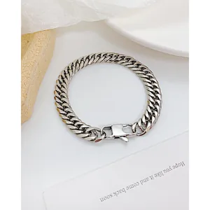 Men's silver cuban link chain bracelet in polished stainless steel with lobster clasp