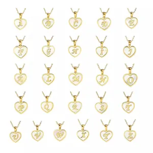 Detailed grid showing 26 heart-shaped 18K gold plated shell initial necklaces from A to Z