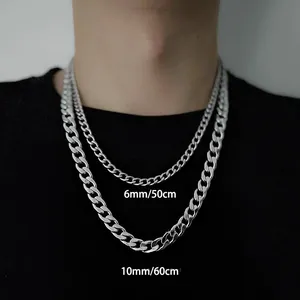Detail showing 6mm and 10mm silver cuban link chains in two different sizes on a model