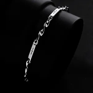 Bracelet à maillons en bambou Mobius en acier inoxydable poli pour hommes avec gravure croix