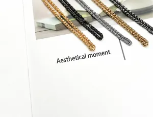 Close-up of durable 3mm stainless steel wheat chains in gold, black and silver finishes