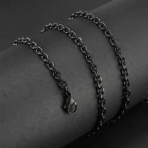 Macro detail of matte black stainless steel chain necklace with sturdy lobster clasp