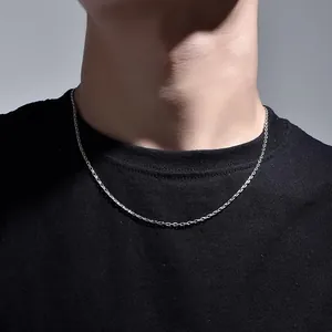Minimalist silver stainless steel cross chain necklace for men shown on neck model