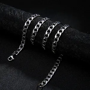 Polished silver stainless steel Cuban link chain necklace with lobster clasp on display