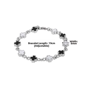 Detail of 19cm adjustable silver steel bracelet with black and white cross links