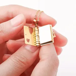 Golden stainless steel heart book locket pendant necklace with an openable page design