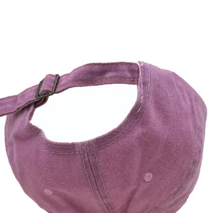 Washed purple cotton baseball cap with adjustable metal buckle and vintage embroidery details