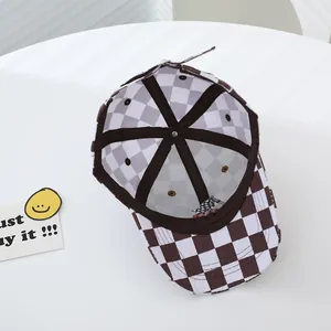 Racing checkered pattern kids baseball cap featuring interior mesh and metal buckle