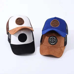 Multiple suede mesh trucker hats featuring the Enjoy Life circular badge detail