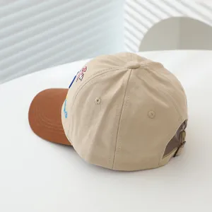 Kids dinosaur embroidery baseball cap in beige and brown with adjustable metal buckle