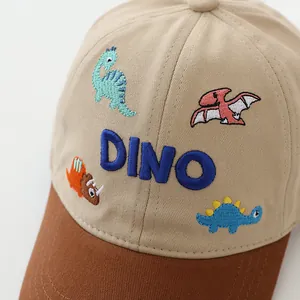 Kids baseball cap with cartoon dinosaur embroidery and DINO text in beige and brown