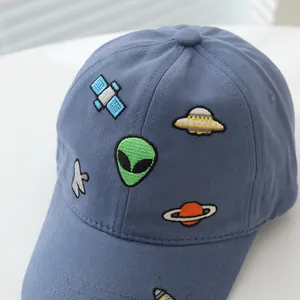 Navy blue kids' baseball cap featuring space alien and planet embroidery patches