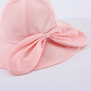 Pink wide brim quick-dry sun hat for girls featuring a large decorative bow