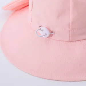 Pink kids quick-dry sun hat with large bow and adjustable drawstring detail