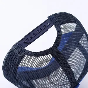 Adjustable navy blue mesh trucker cap with snapback closure for summer breathability