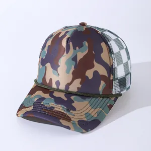 Camo trucker hat with checkered mesh and green decorative rope on a white background