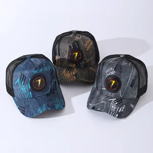 Graffiti trucker caps with number 7 patch in navy, green and grey mesh denim