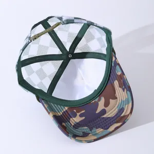 Internal view of camouflage trucker hat showing mesh panels and adjustable snapback strap