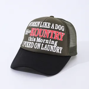 Detail of vintage trucker hat featuring 3D red Kountry embroidery and breathable mesh