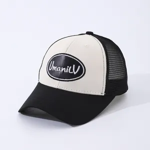 Classic black and white trucker hat featuring Working embroidery and breathable mesh back