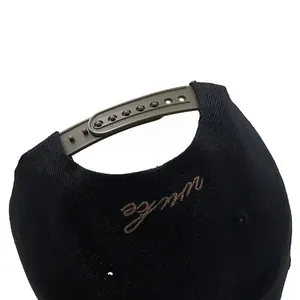 Black camouflage baseball cap back view with brown embroidery and green snapback closure