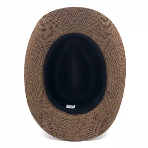 Cappello di paglia marrone scuro a tesa larga con struttura interna ed etichetta