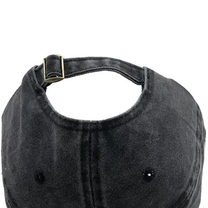 Washed black denim baseball cap with adjustable bronze metal buckle back view